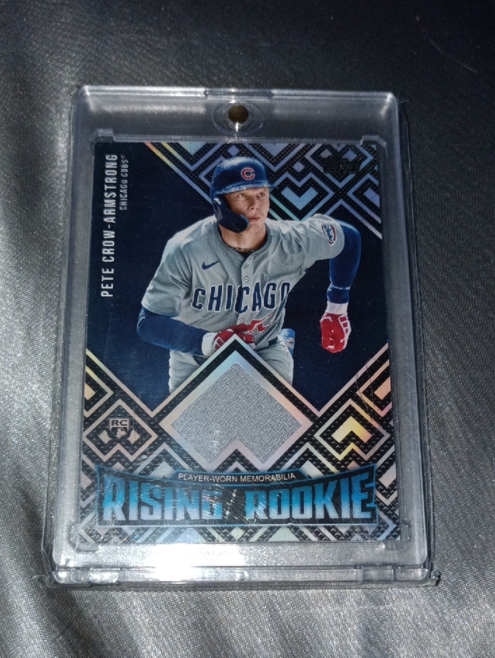 Pete crow-Armstrong Topps Green Geometric Rising Rookie Relic Card.